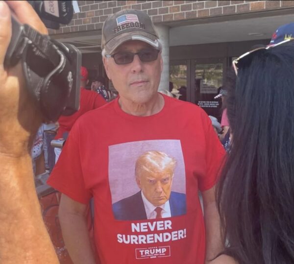 Trump’s indictments – and mug shot shirt – are deepening his supporters’ anger and revving up their support